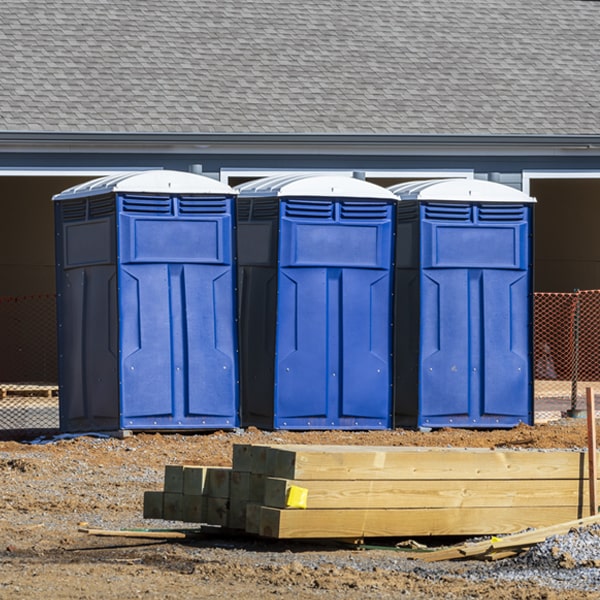 what is the cost difference between standard and deluxe porta potty rentals in Livonia MN